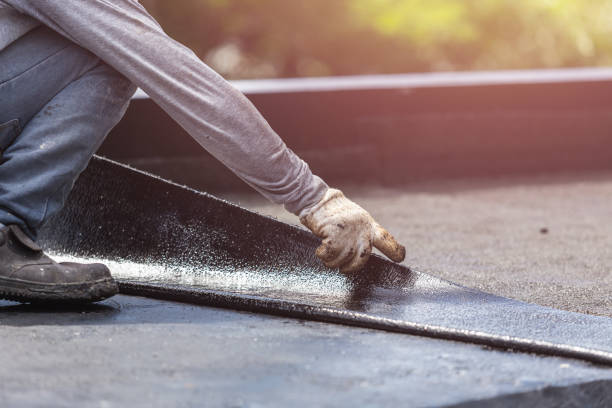 Professional Basement Waterproofing technician working in Dundee, NY
